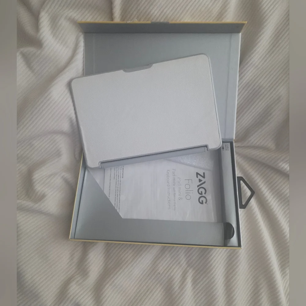 ZAGG Folio hinged keyboard folio for ipad mini. New In Box